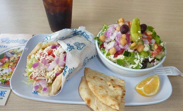 Chicken Pita with small Geek Salad and Pita Bread. Good, healthy food!