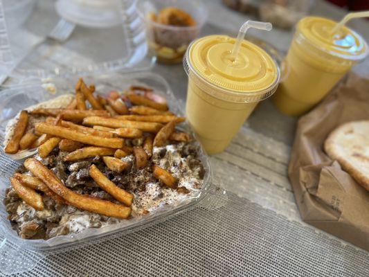 Gyro Platter - gyro meat with hummus and tzatziki sauce with delicious crispy fries. + Mango Lassis!