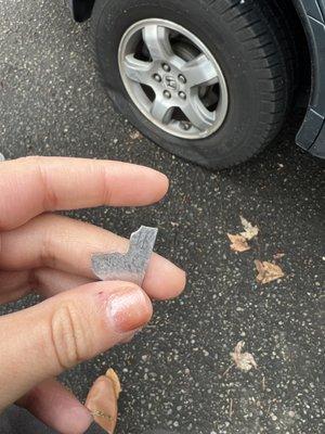 This was stuck in my tire from the towing company.