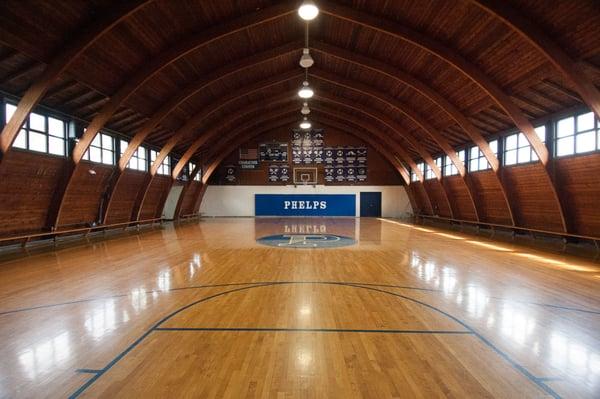 Our gymnasium is high regulation with two nets.