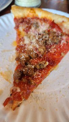 A slice of meatlovers (I like to always add some garlic powder and parm to my pizza).