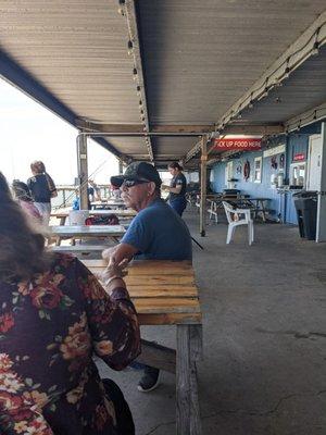 Locals enjoying sunny day at the marina.