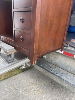 My poor very heavy desk the walked it on the asphalt destroying the legs. The front has major scratches and a piece missing...