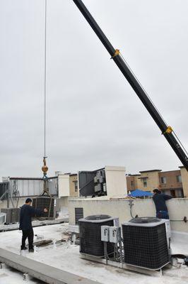 installing a condenser on a roof