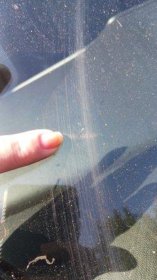 The knick on the windshield and resulting scratches I mistook for dirt or a bug on initial test drive