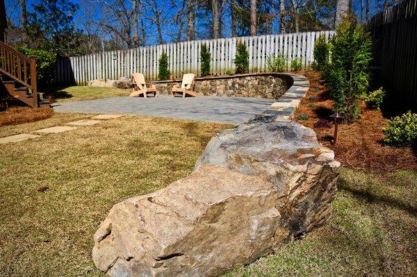 paver patio with landscape boulders