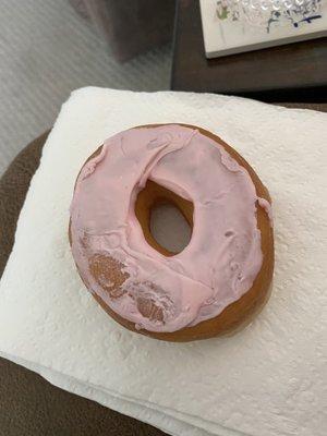 Strawberry iced donut with sprinkles. ‍‍