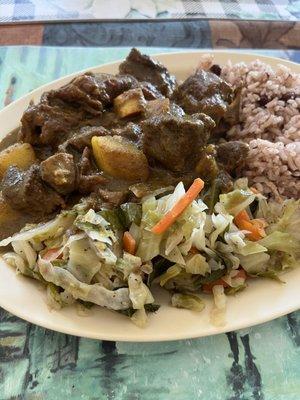 Curry Curried Goat rice and peas . Note this is a small order