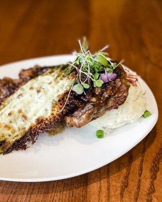 Prepare to savor perfection! Our 12oz ribeye with Bacon jam glaze, loaded mash, and mozzarella roasted asparagus is a taste s...