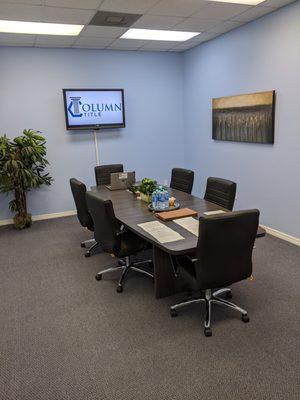 Large closing room and conference table.