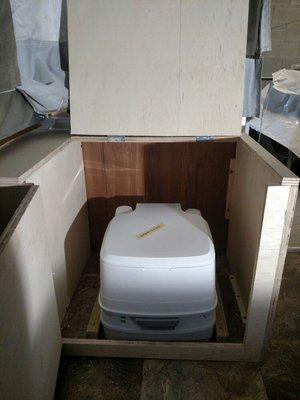 Customising a pop up camper for a porta potty hide a way cabinet