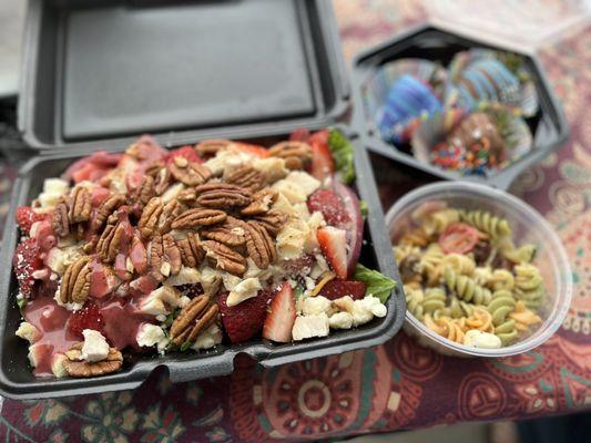 Summer salad, pasta salad and chocolate covered strawberries.