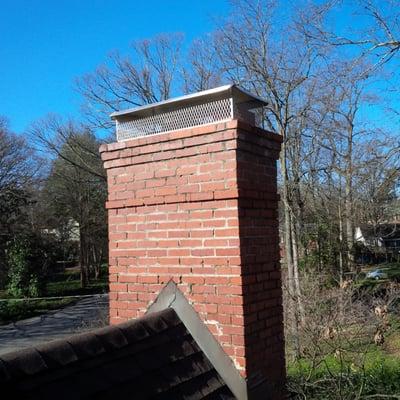 Stainless Steel Multi Flue Chimney Cap. Sold and Installed by Chimney Sweep Experts