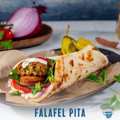 FALAFEL PITA
Homemade Chickpea Fritters in a Pita with Hummus, Red Onion, Lettuce, Tomatoes, and Tzatziki