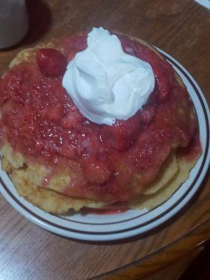 The best 11$ ever spent on a full stack with strawberry's and whipped crème.