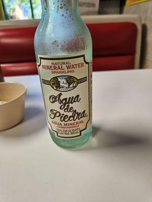 Ice cold mexican mineral water in a glass bottle