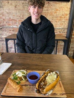 My son w my meal as he's waiting for his to come next