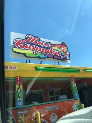 Maxi Raspados.. can't miss them with their bright signage.