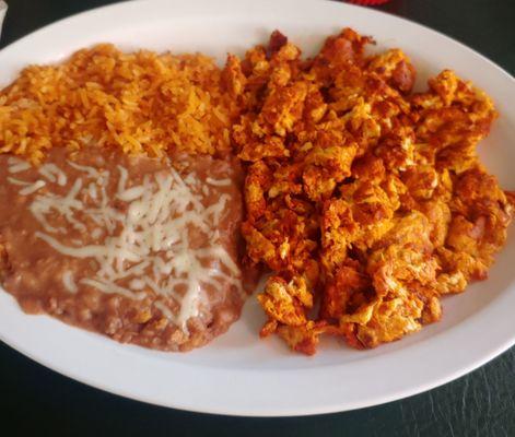 Chorizo and eggs with rice and beans.