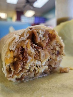 Bacon Breakfast Burrito. Bacon, egg, potato, cheese.