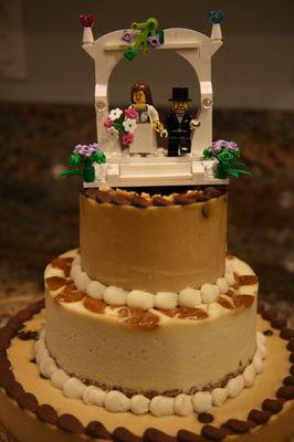 Amazing wedding cake with chocolate chip peanut butter on top/bottom, with lemon-fig in the middle