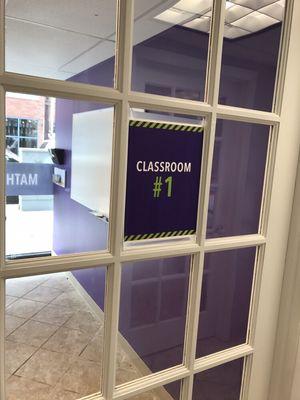 Brightly lit classrooms with full visibility for parents