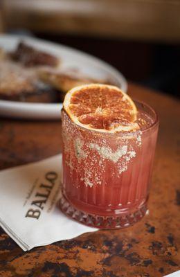 Spicy blood orange margarita with basil salt