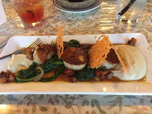 Scallops, Celery Root Purée, Pork Belly, Spinach, and Parmesan Crisps with a Citrus Glaze.  Yum.