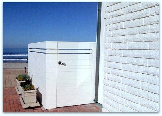 Mixed width Alaskan Yellow Cedar horizontal wood fence and metal frame gate primed painted to match ocean front residence, Del Mar, Ca.