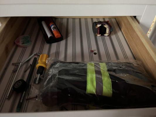 Another bedroom dresser drawer. Most of this stuff was from other rooms in the house. Not sure how it got here.