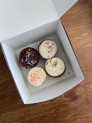 Cupcakes to go! Chocolate, red velvet, carrot, and raspberry lemon