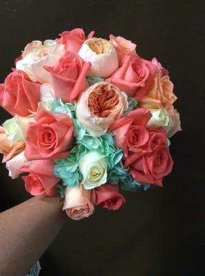 Coral bridal bouquet Buds Etc