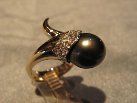 Cornucopia design with pave diamonds and South Seas Black Pearl.