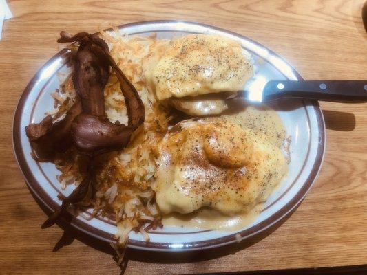 Eggs Benedict with hash browns and a side of bacon. Definitely hit the spot!