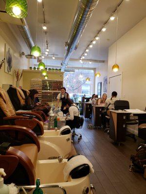 6 pedicure stations and 6 manicure stations