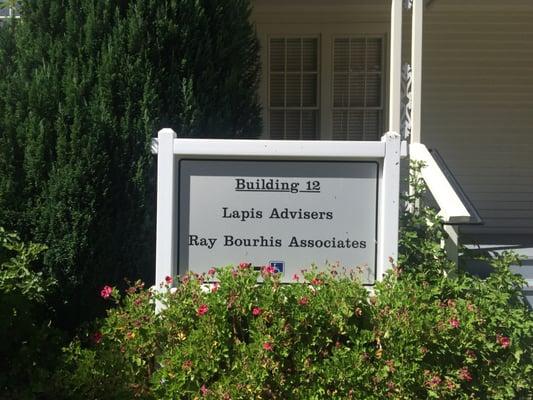 Building 12 Sign for Ray Bourhis Associates (Suite B) and Lapis Advisers (Suite A).