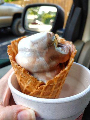 Chocolate vanilla swrill in a waffle cone