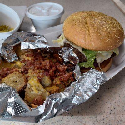 Cheeseburger and loaded potatoes.