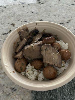 Meatballs mushrooms and brisket over rice