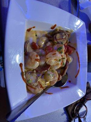 Shrimp and grits. Awesome and very cheesy!