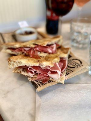 Deliziosa. Prosciutto with pecorino cheese and black truffle sauce.