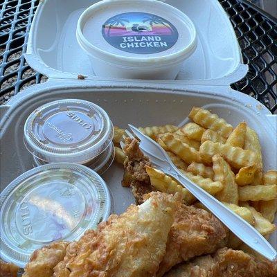 Chicken strips, fries, coke slaw and creamed corn.