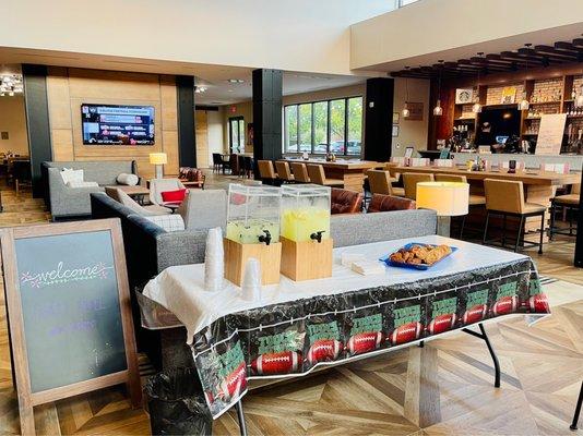 Table with free lemonade & cookies for in house guest