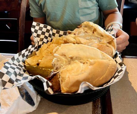 Philli cheesesteak with chips. Great portions