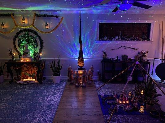 Studio showing alter, Garuda,  and mesa. Space is continuously infused with frequency music to set the tone for feeling at peace and loved.