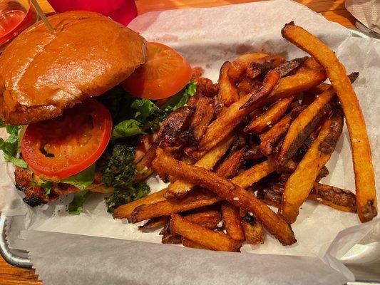 Chimichurri chicken sandwich with fries.