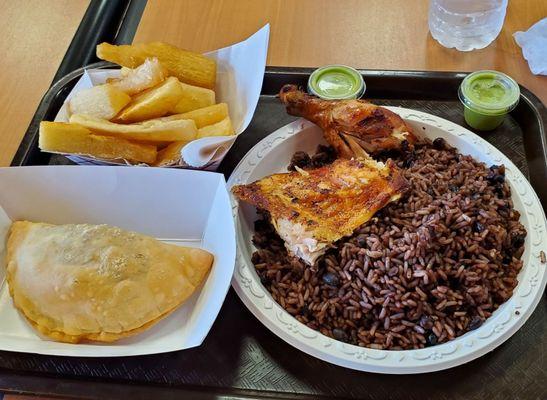 Fried yucca, beef Empanadas, chicken and Moro rice.