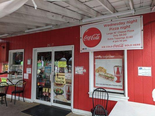 Front entrance...but it's closed from going in right now with Covid-19 and all. Pickup food thru window on left