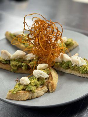 Avocado toast points with jumbo lump crab