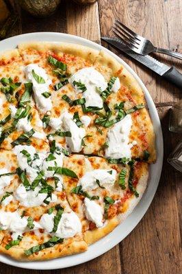 Burrata Pizza: Homemade pizza dough. Tomato sauce, mozzarella, burrata and fresh basil